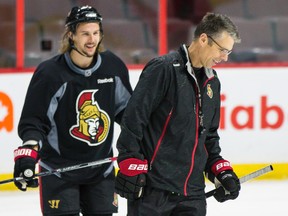 Ottawa Senators head coach Dave Cameron and captain Erik Karlsson. (Errol McGihon/Ottawa Sun/QMI Agency)
