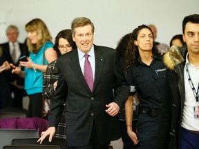 Toronto Mayor John Tory wades through the crowd at the conclusion of a United Way fundraising event on Wednesday December 10, 2014. (Stan Behal/Toronto Sun)