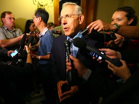 Energy minister Bob Chiarelli addresses the media in June 2014. (Dave Abel/Toronto Sun files)