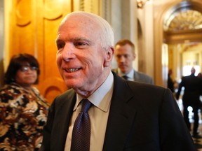 U.S. Senator John McCain (R-AZ) leaves after Senator Dianne Feinstein's (D-CA) speech on the Senate floor on Capitol Hill, in Washington December 9, 2014.   REUTERS/Yuri Gripas