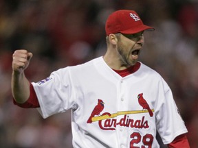 The Blue Jays wouldn’t pay Chris Carpenter the minimum salary following an injury in 2002 and he wound up in St. Louis. (REUTERS/FILE)