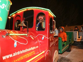 Airdrie, Alta. - Visitors board Santa's Express as the Airdrie Festival of Lights opens up to the public in Nose Creek Park on Monday, Dec. 1, 2014. 
Britton Ledingham/Airdrie Echo/QMI Agency