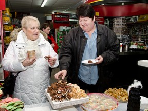 Shelley Henley and Sandra Apselt enjoy the treats provided during Allan's Home Hardware's Ladies night last Thursday.