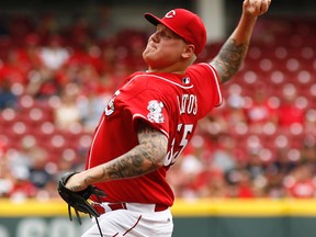 Cincinnati Reds starting pitcher Mat Latos (55) throws against the Washington Nationals in the second inning at Great American Ball Park on Jul 27, 2014 in Cincinnati, OH, USA. (David Kohl/USA TODAY Sports)