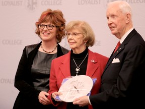 Loyalist President and CEO Maureen Piercy, left, and Campaign Co-Chair Wilf Wilkinson, right, thank donor Audrey Williams.