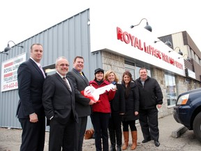 Royal LePage Triland Realty officially opened its new office at 808 Talbot St. in St. Thomas on Thursday, Dec. 11, 2014. Marking the occasion were broker-manager Adam Miller, left, broker-owner Peter Hoffman, broker-owner Peter Meyer, St. Thomas Mayor Heather Jackson, Karen Vecchio (representing Elgin-Middlesex-London MP Joe Preston), Whitney McWilliam (representing MPP Jeff Yurek) and Warren Allen, member services rep for the St. Thomas Chamber of Commerce.
Ben Forrest/Times-Journal