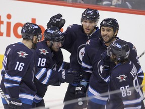 The Jets are hoping to keep the good times rolling when they play the Avalanche in Denver on Thursday night. (Brian Donogh/Winnipeg Sun file photo)