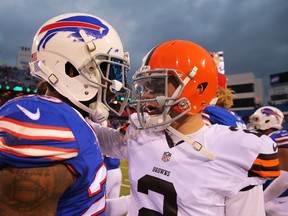 Aaron Williams #23 of the Buffalo Bills and Johnny Manziel #2 of the Cleveland Browns talk after the game at Ralph Wilson Stadium on November 30, 2014 in Orchard Park, New York. (Brett Carlsen/Getty Images/AFP)