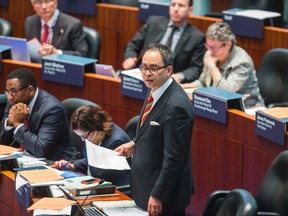Councillor Denzil Minnan-Wong during a council meeting in City Hall in Toronto on Thursday, December 11, 2014. (Ernest Doroszuk/Toronto Sun)