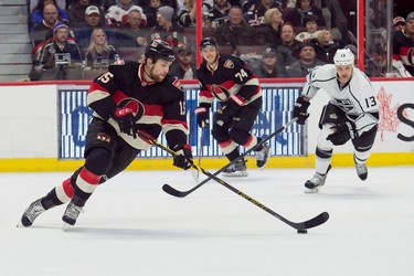 Dec 11, 2014; Ottawa, Ontario, CAN; Ottawa Senators center Zack Smith (15) skates with the puck in the first period against the Los Angeles Kings at the Canadian Tire Centre. Mandatory Credit: Marc DesRosiers-USA TODAY Sports