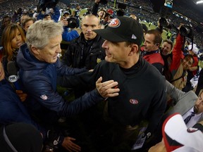 Seattle Seahawks coach Pete Carroll and San Francisco 49ers coach Jim Harbaugh (Reuters).