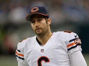Jay Cutler #6 of the Chicago Bears looks on from the bench during the first quarter while playing the Detroit Lions at Ford Field on November 27, 2014 in Detroit, Michigan. (Gregory Shamus/Getty Images/AFP)