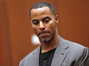 Former professional football player Darren Sharper appears for his arraignment in Los Angeles, California in this file photo taken February 20, 2014. (REUTERS/Mario Anzuoni/Files)