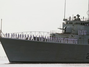 Sailors of the Canadian Navy stand on board the HMCS Athabaskan as it enters Baltimore Harbor near Fort McHenry in Baltimore, Maryland September 10, 2014. REUTERS/Gary Cameron/files