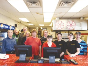 Pictured here (from left to right) are (back row) the band’s drummer, Alex Barlow, Rural Business Network owners, Patrick and Linda Nagle, the band’s guitar and bass player, Norman Barlow, (front row) owner of Max Print & Copy, Steve Burch, the band’s guitar and bass player, Wade Jewell, Godfather’s Pizza employee, Sarah Jantzi, manager of Godfather’s Pizza, Andrea Varey, and Godfather’s Pizza employees, Natasha Mahon and Bella Varey.
