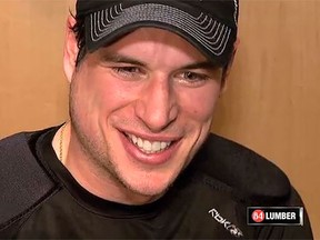 Sidney Crosby smiles during a media scrum on Friday Dec. 12, 2014. (NHL.com screengrab)
