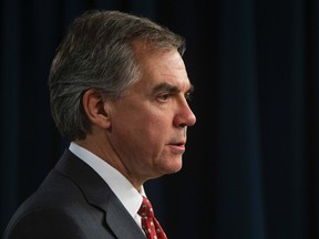 Alberta Premier Jim Prentice speaks at the Alberta legislature, in Edmonton Alta., on Tuesday Nov. 18, 2014. David Bloom/Edmonton Sun