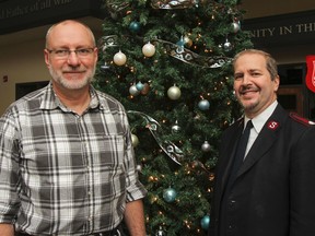 Ed Peterson, left, Salvation Army Christmas campaign co-ordinator, and Salvation Army Major David McNeilly are looking to the public for help with this year's Jerome Taylor Memorial Whig-Standard/Salvation Army Christmas Hamper Fund. (Julia McKay/The Whig-Standard)
