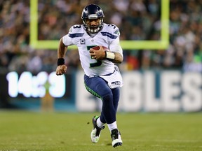 Quarterback Russell Wilson and the Seahawks overcame a rough start en route to compiling a 9-4 record. (AFP/PHOTO)
