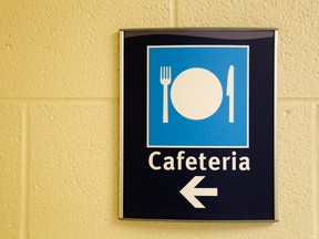 A sign points the way to the cafeteria in Belleville General Hospital. Quinte Health Care proposes reassigning six cafeteria staff and recruiting popular brands to provide food at three of its four hospitals. Luke Hendry/The Intelligencer