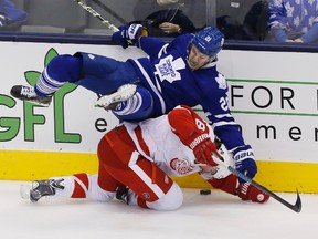 Maple Leafs’ James van Riemsdyk, shown colliding with Red Wings’ Justin Abdelkader during a game in late November at the ACC, says a “dislike” between the teams is becoming apparent. (USA TODAY SPORTS/PHOTO)