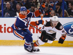 Leon Draisaitl runs into Ducks defenceman Sami Vatanen during the first period of Friday's game at Rexall Place. (Ian Kucerak, Edmonton Sun)