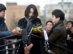 Cho Hyun-ah, also known as Heather Cho, daughter of Korean Air Lines chairman, Cho Yang-ho, appears in front of the media outside the offices of the Aviation and Railway Accident Investigation Board of the Ministry of Land, Infrastructure, Transport, in Seoul December 12, 2014. Cho, 40, who was an executive at South Korea's flag carrier in charge of in-flight service until she quit this week, was being removed from all posts at affiliate companies. On December 19, while at New York's John F. Kennedy airport, seated in first class on a South Korea-bound flight, she was displeased with being served macadamia nuts in a bag and not a dish. The pilot brought the plane back to its gate for the cabin crew chief to be expelled.  (REUTERS/Song Eun-seok/News1)