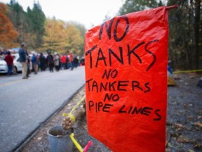 An anti-oil tanker sign is pictured near a demonstration against the proposed Kinder Morgan pipeline on Burnaby Mountain in Burnaby, British Columbia November 17, 2014. REUTERS/Ben Nelms