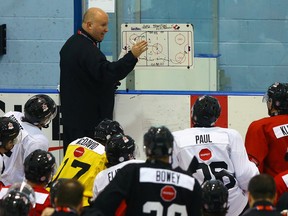 Coach Benoit Groulx talks to the team during the Canadian world junior selection camp at the MasterCard Centre in Toronto December 12, 2014. (Dave Abel/Toronto Sun/QMI Agency)