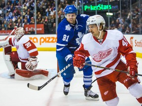 Toronto Maple Leafs Phil Kessel and Detroit Red Wings Darren Helm during 3rd period action at the Air Canada Centre in Toronto on Nov. 22, 2014. (Ernest Doroszuk/Toronto Sun)