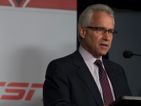 Tom Renney announcing the names of 29 players who were invited to the selection camp in preparation for the World Junior Hockey Championship on Monday, December 1, 2014, in Montreal. (CHANTAL POIRIER/QMI AGENCY)