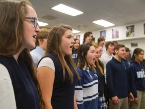 Mary MacLean, left and Abbey Anthony, next left, are part of the CCH grade 11 vocal class who sang at the children's floor at Victoria Hospital.
They were practicing at their school in London, Ont. on Thursday December 11, 2014.  Mike Hensen/The London Free Press/QMI Agency