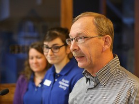 Lennard Donker speak to city council about his wife's struggle with Alzheimer, while Hannah Brown and Kristel Nicholas from the Alzheimer Society, look on. Jason Miller/ The Intelligencer