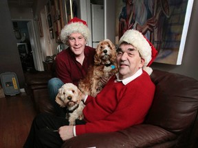 Illustrator Stephen Sammon and Author Bernard J Muzeen shown at home on Friday Dec. 12, 2014.  Stephen and Bernard have created children's books about Santa and Christmas, emphasing how important it is to keep the word Christmas. 
Tony Caldwell/Ottawa Sun/QMI Agency