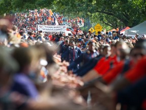 Players with the Auburn Tigers greet fans during Auburn's Tiger Walk prior to their game against the San Jose State Spartans on September 6, 2014 at Jordan-Hare Stadium in Auburn, Alabama.   (Michael Chang/Getty Images/AFP)
