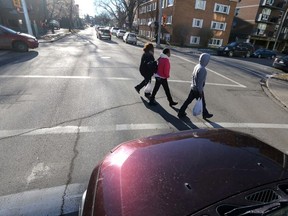 Illustration for pedestrians and traffic in Calgary, Alta., on Sunday December 14, 2014. Mike Drew/Calgary Sun/QMI Agency