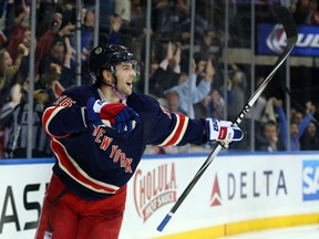 New York Rangers centre Derick Brassard (16) celebrates his game-winning goal against the Detroit Red Wings during the overtime period at Madison Square Garden. (Brad Penner-USA TODAY Sports)