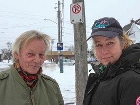 Star Diner owners David Blougett and Ida Mae Lowes stand in front of the no parking sign still up along Drayton Street in Kingston. The street has two pay and display meters for the 22 parking spots available but because the no parking signs haven't been taken down, more than half the spots appear to not be available. (Julia McKay/The Whig-Standard)