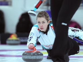 Skip Michelle Montford delivers a stone in the Manitoba Curling Tour championship final against Barb Spencer at Assiniboine Memorial Club in Winnipeg, Man., on Sun., Dec. 14, 2014. Montford won 5-2. Kevin King/Winnipeg Sun/QMI Agency