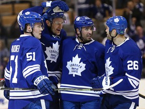 Maple Leafs' Cody Franson (second from left) celebrates his goal against  the Los Angeles Kings in Toronto on Sunday. (CRAIG ROBERTSON/TORONTO SUN)