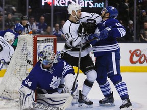 Maple Leafs defenceman Stephane Robidas (right) battles with Los Angeles Kings forward Kyle Clifford in front of the Leafs net last night at the Air Canada Centre. (JOHN E. SOKOLOWSKI/USA Today Sports)