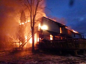 Quinte West Fire crews responded to a fully involved house fire on Johnstown Road in Sidney Ward Friday afternoon, Dec. 12, 2014. Quinte West Fire Chief John Whelan said dispatchers received over thirty �911 calls from motorists on Highway 401. The century old farm house was destroyed in the fire. � SUBMITTED PHOTO