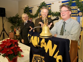 Kiwanis member and local comedian John Lewis, right, announces the total donations collected during the 64th annual Kiwanis luncheon in support of the Salvation Army. Through auctions, raffles and donations community members donated a total of $102,500 in just a few hours for the local Salvation Army. At far left is Maj. Vaden Vincent of the local Salvation Army.
Emily Mountney-Lessard/The Intelligencer