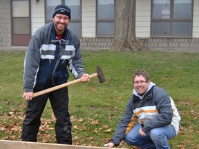 Scott Van Gerwen (left), and John Nater were two of the several volunteers helping put together the West Perth Outdoor Rink Dec. 13. The community rink’s new location is the former lawn bowling green beside the Friendship Centre. Temperatures will have to be in the -8 to -10 degree range consistently before the ice can be put in. SUBMITTED