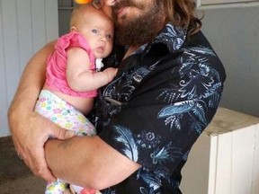 Cliff Sherlock, pictured here with his granddaughter, is collecting donations to donate to the Stollery Children’s Hospital. In return he will shave his hair, beard and moustache.