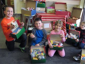 St. Patrick’s, Dublin students involved with the Operation Christmas Child shoebox program are Jack Nolan (left), Joey Crowley, Kora Smith, Nathan Follett, Dylan Simpson. SUBMITTED