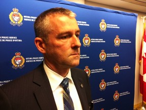 Insp. Chris Renwick takes questions at a press conference Monday announcing the arrest of 27 people in gang and drug-related raids. Cops seized drugs, guns and cash after bringing Projects Karma and Calamity to a close. 
(TONY SPEARS/Ottawa Sun/QMI Agency)