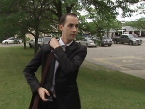 Michael Sona walks to court in Guelph, Ont. in this undated screen capture from video. (Sun News/QMI Agency)