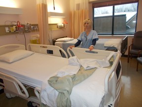 A nurse stands between the new and old recovery beds at Hotel Dieu Hospital on Monday. (Emma Brown/For The Whig-Standard)