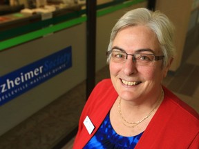 Luke Hendry/The Intelligencer
Executive director Laura Hare stands outside the Alzheimer Society of Belleville-Hastings-Quinte office at the Bay View Mall in Belleville, Tuesday. Its board and that of its Prince Edward County counterpart are expected to vote to merge the agencies Dec. 22. The change, if approved, will take effect April 1.